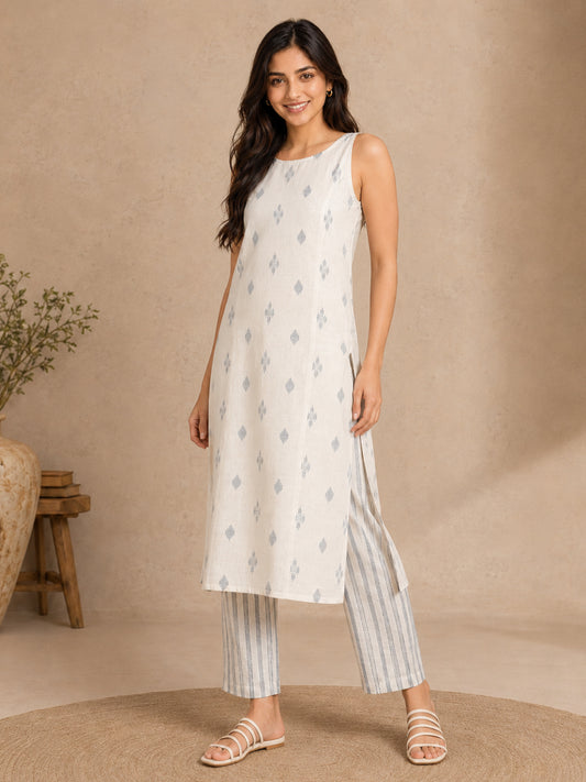 Sleeveless Off White Kurta with Blue Butti and Pant - BluAuraa