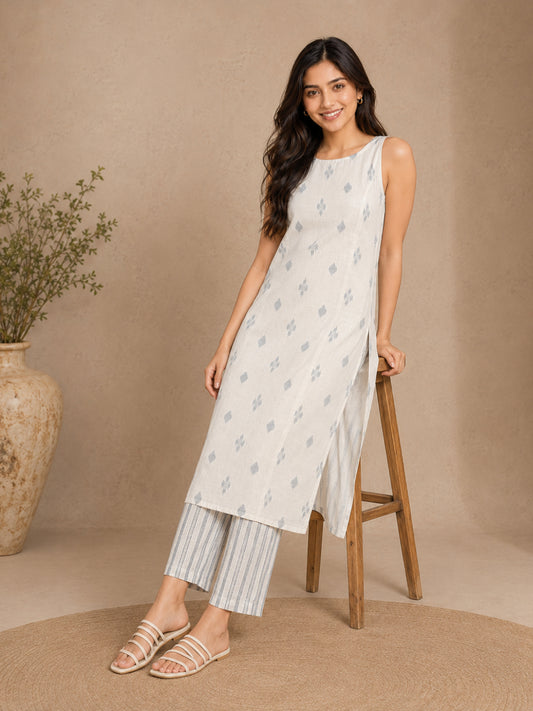 Sleeveless Off White Kurta with Blue Butti and Pant - BluAuraa