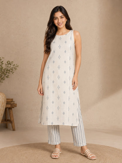 Sleeveless Off White Kurta with Blue Butti and Pant - BluAuraa