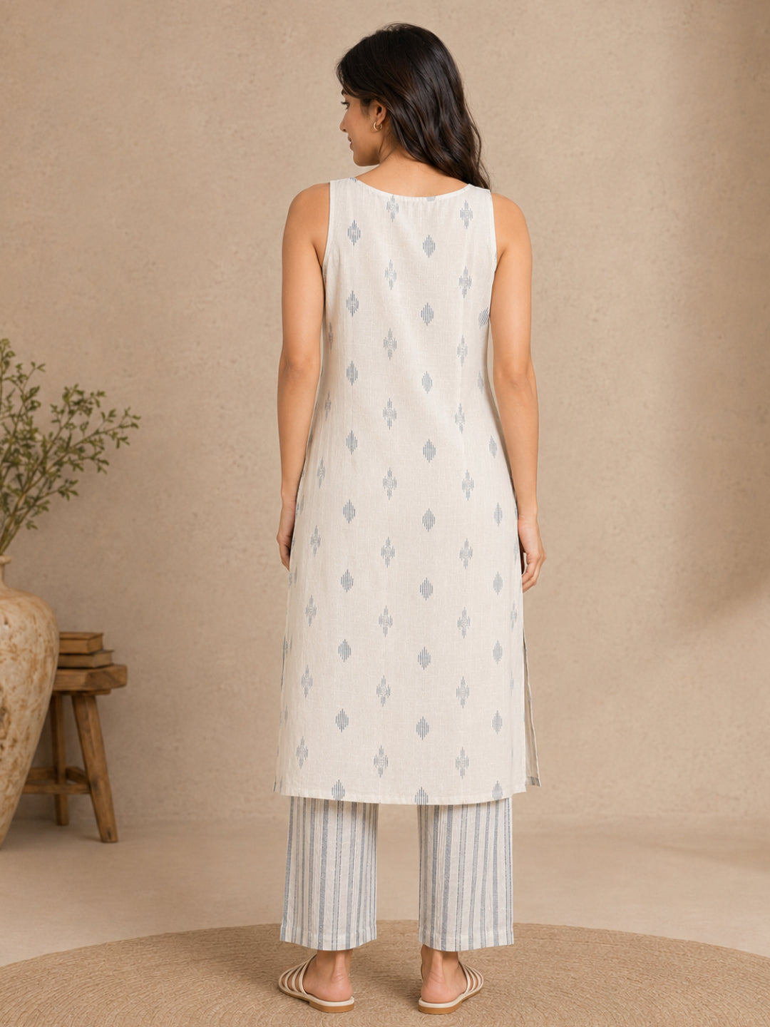 Sleeveless Off White Kurta with Blue Butti and Pant - BluAuraa