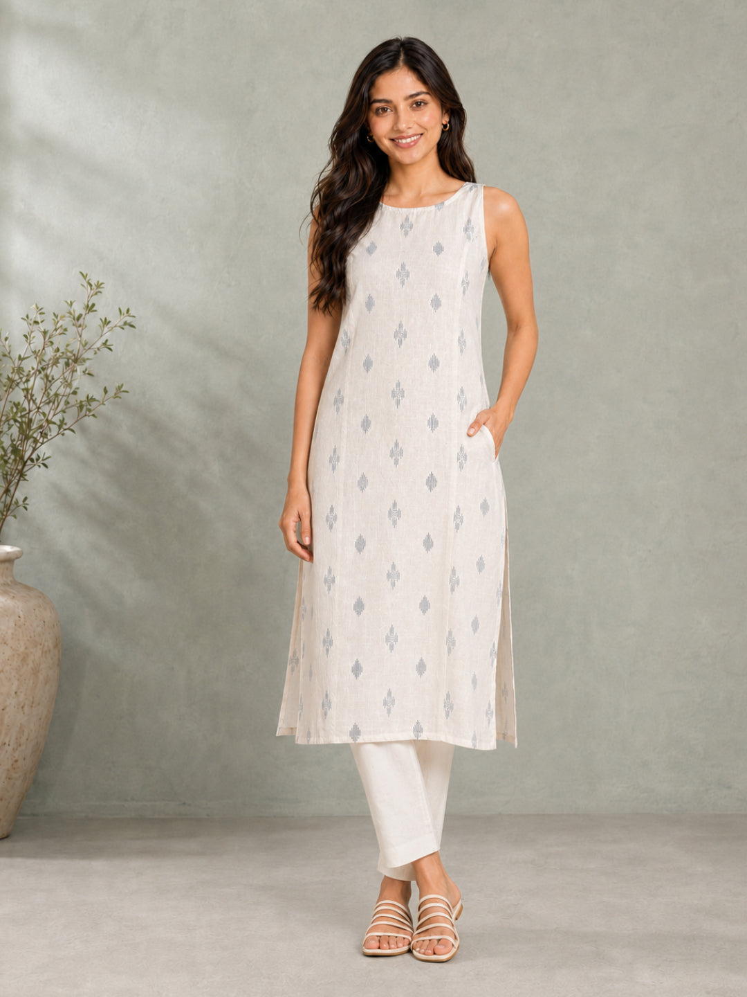 Sleeveless Off White Kurta with Blue Butti - BluAuraa