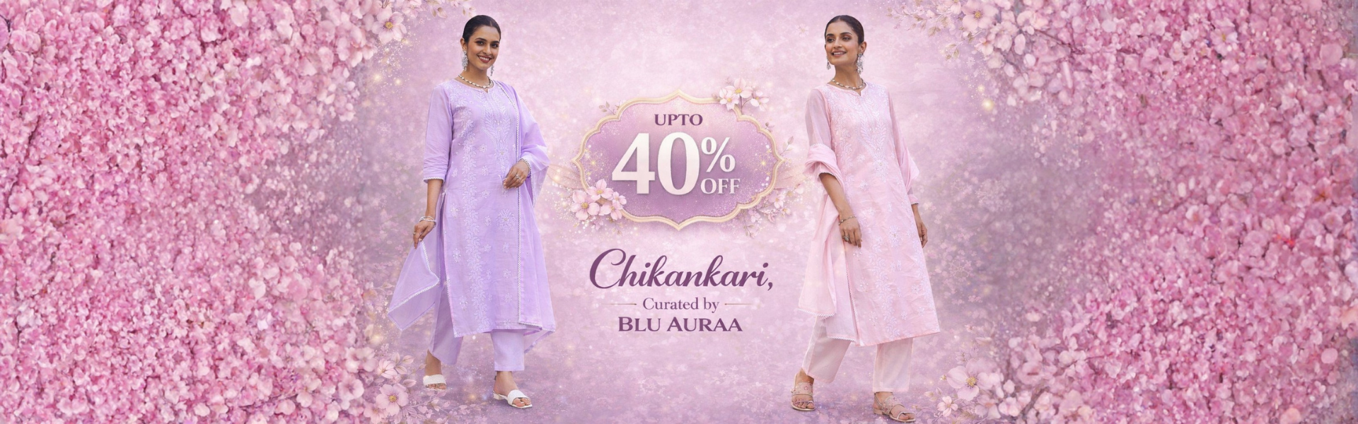 Two women in traditional attire on a pink floral background with a promotional banner for 'Chikankari' by Blu Auraa.